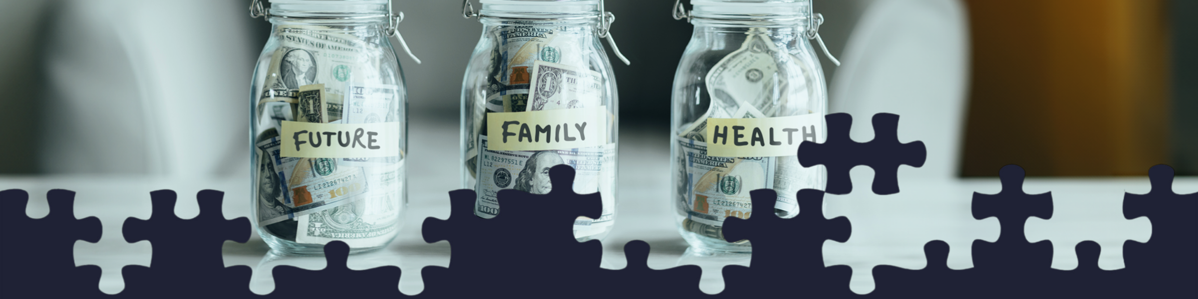 Three glass jars of savings labeled future, family, and health